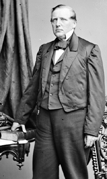 Secretary of the Interior Usher displays a fine example of a tailcoat and elaborate cravat that was often used for dress occasions. 